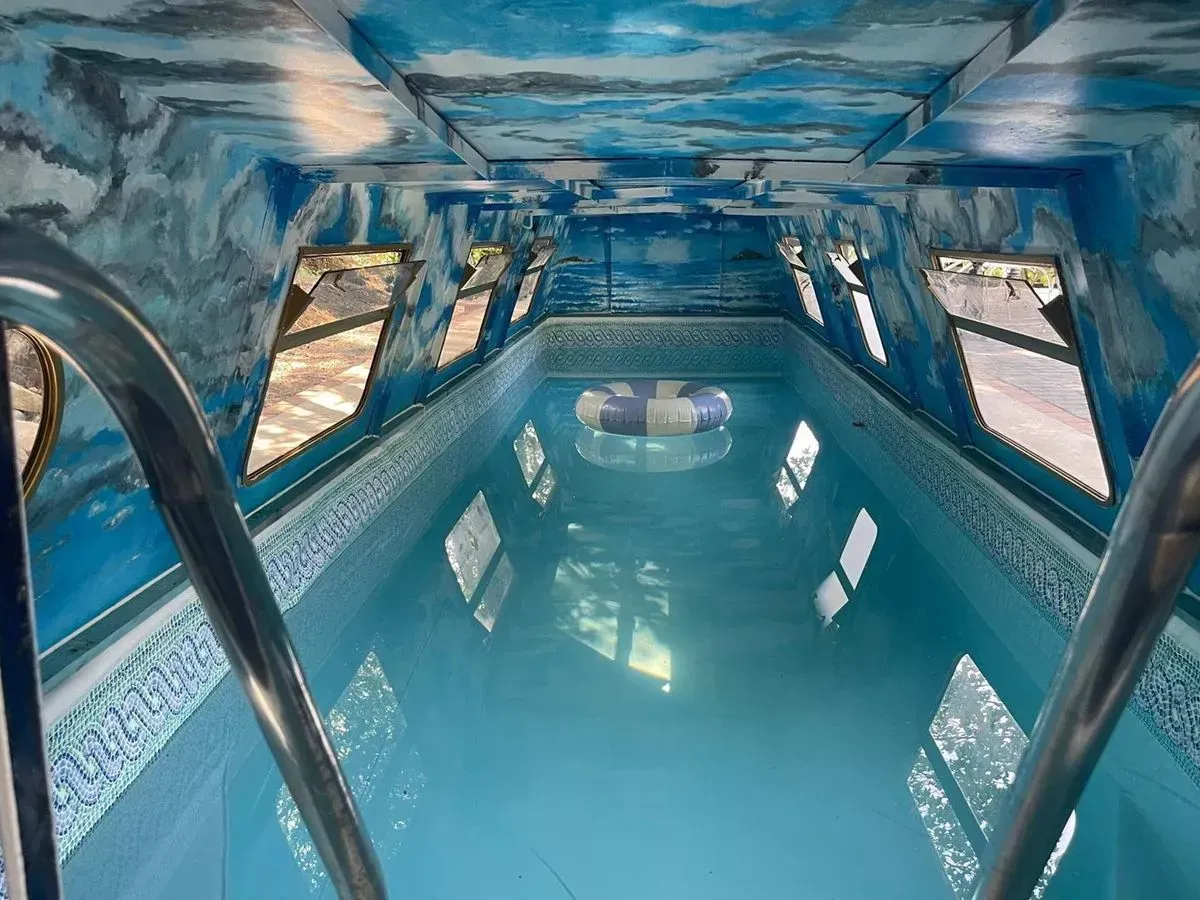 Hotelier Transforms Narrowboat into Unique Canal Lock Swimming Pool