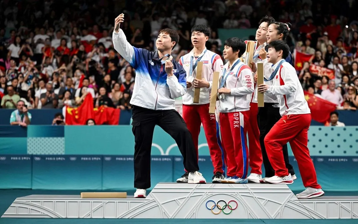 North Korean Olympians Face Scrutiny Over Selfie with South Korean Rivals