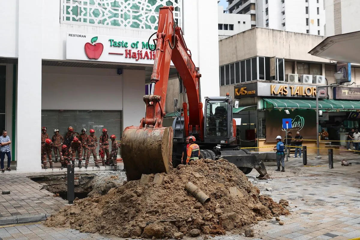 Tourist Vanishes in Kuala Lumpur Sinkhole: Rescue Efforts Continue