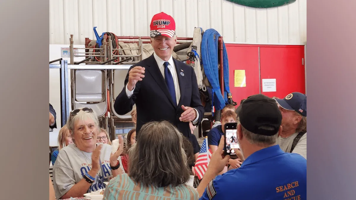 Biden Dons Trump Cap at PA Fire Station: A Gesture of Unity