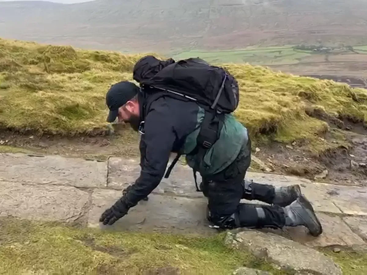 Elderly Man Crawls Uphill After Bus Route Axed, Sparking Community Outcry