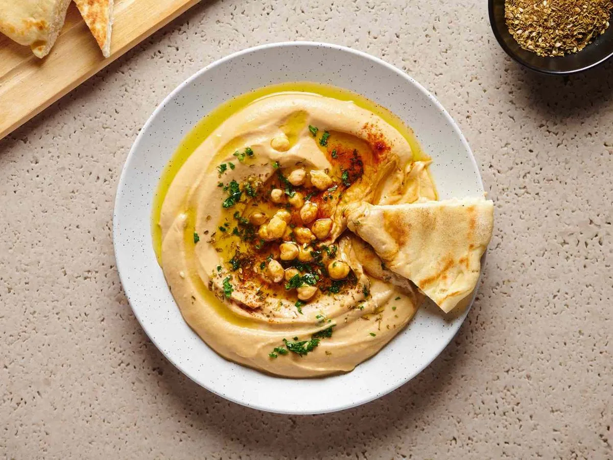 Hummus Craze: UK's Favorite Dip Sparks Eco-Debate and Cultural Reflection