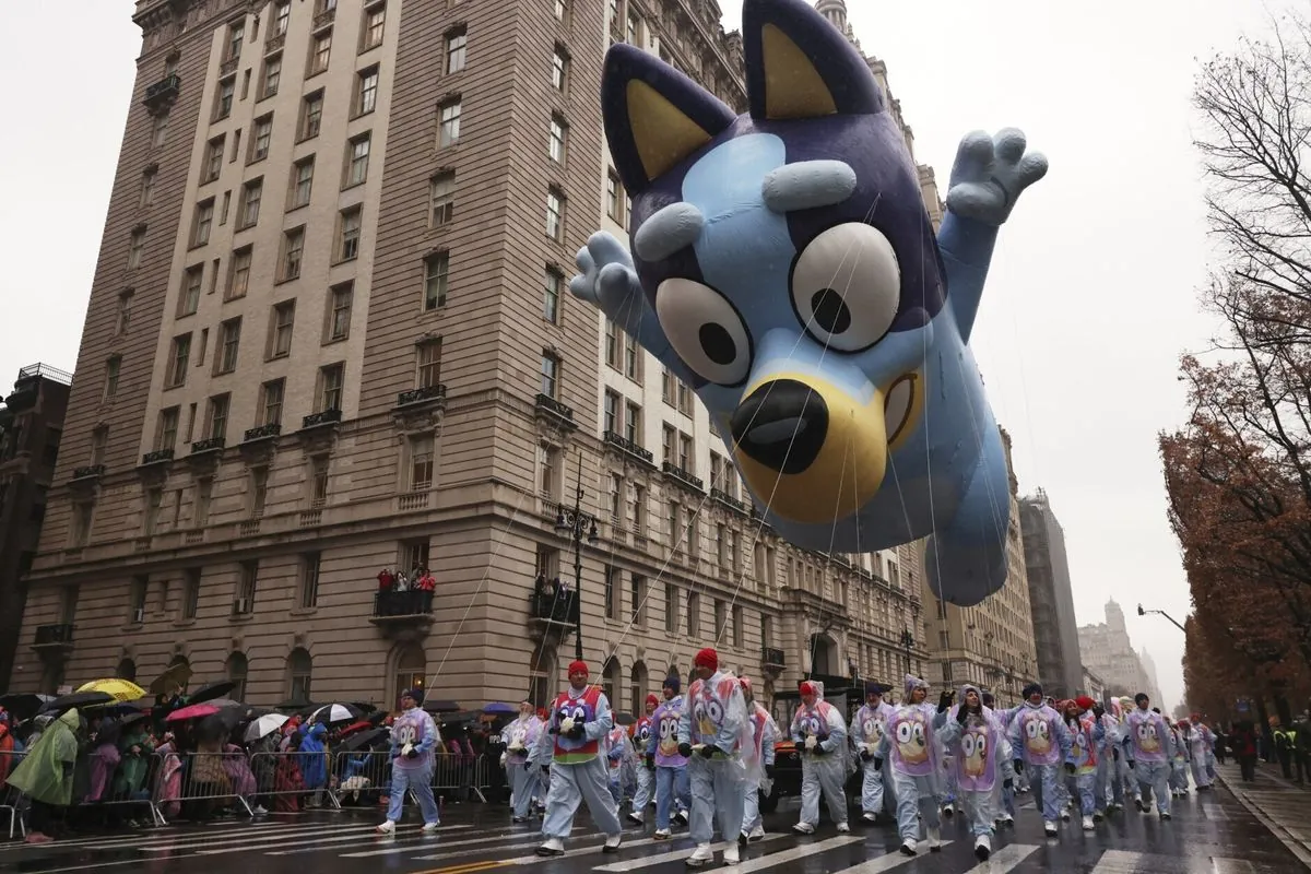 New York's biggest holiday parade gets unexpected guests and rain showers